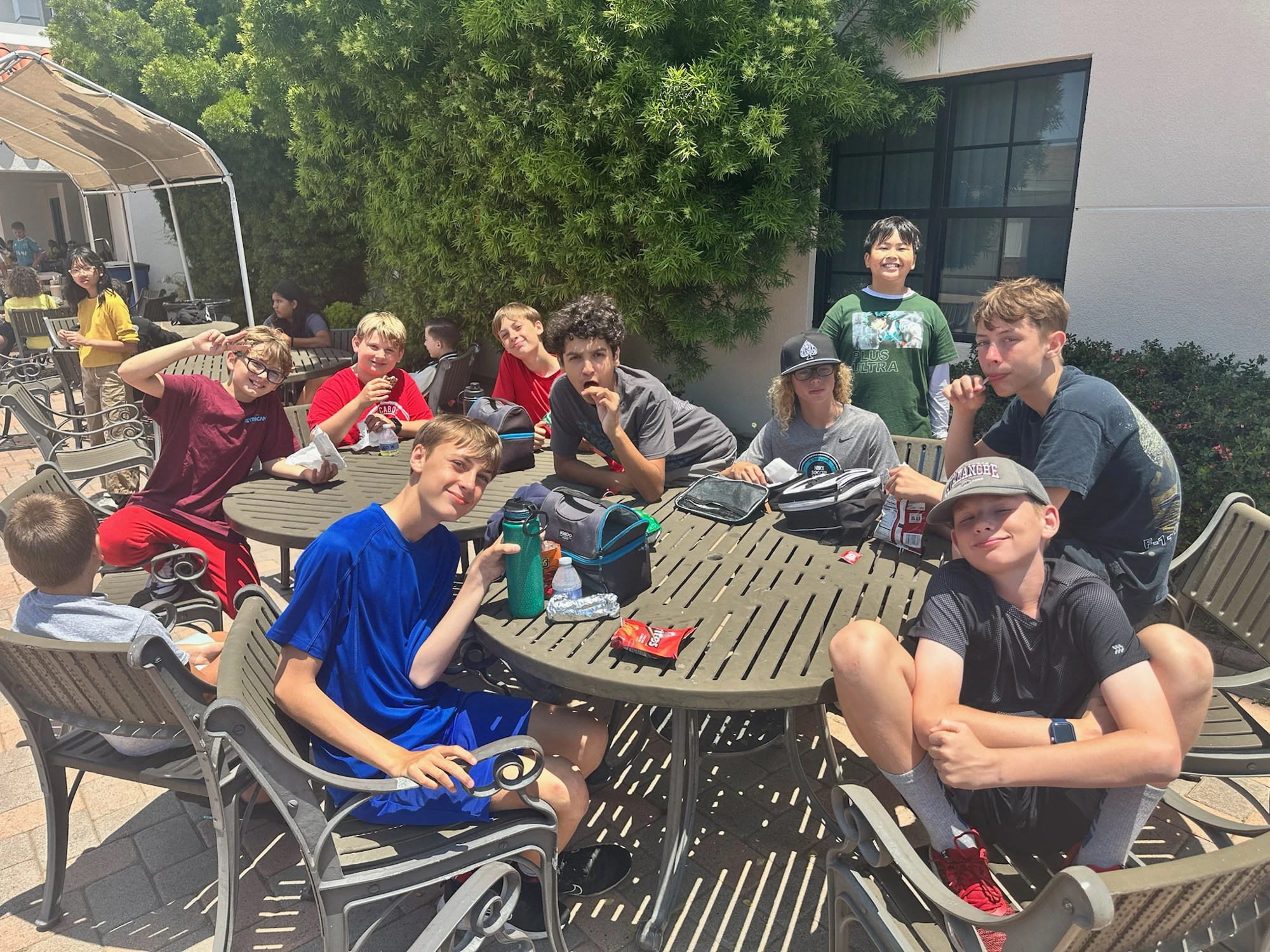 Page Academy middle school students together on the Costa Mesa campus patio