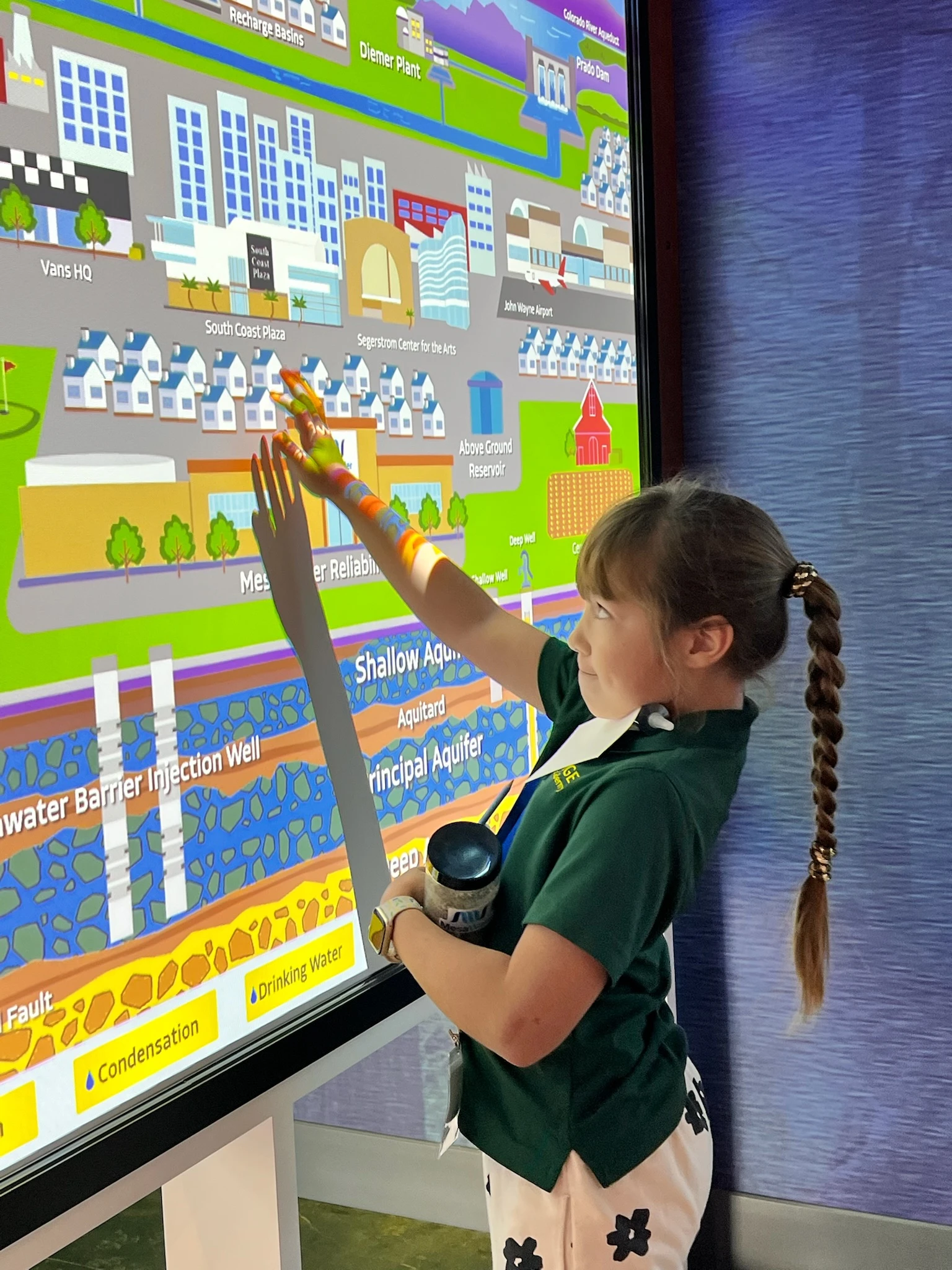 Student working at an interactive whiteboard